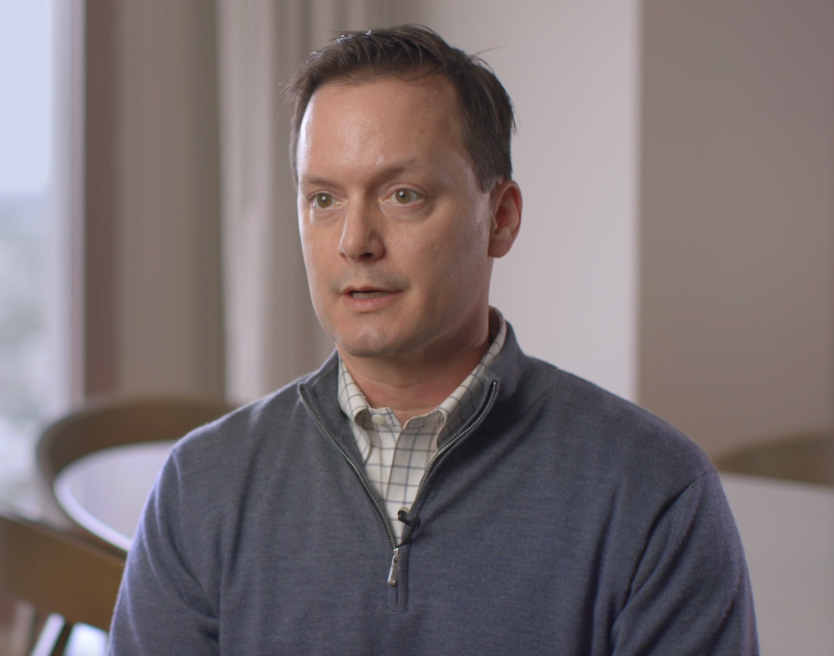 Dr. Patrick Garvey looks at the interviewer in a still photo from a video interview